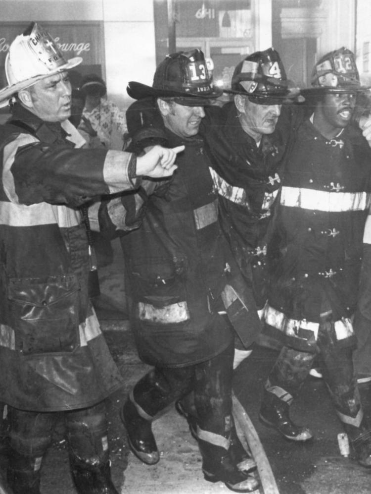 FDNY Chaplin Al. Thompson & Brother help injured Brother.jpg
